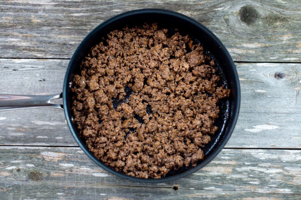 ground beef cooked in a pan