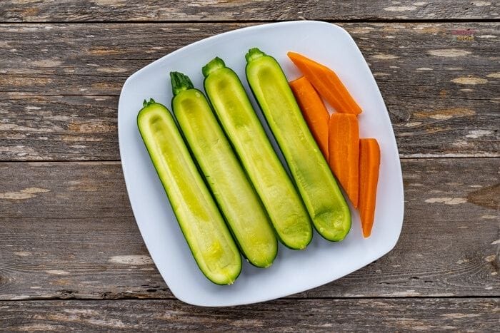 zucchini on a plate with carrots