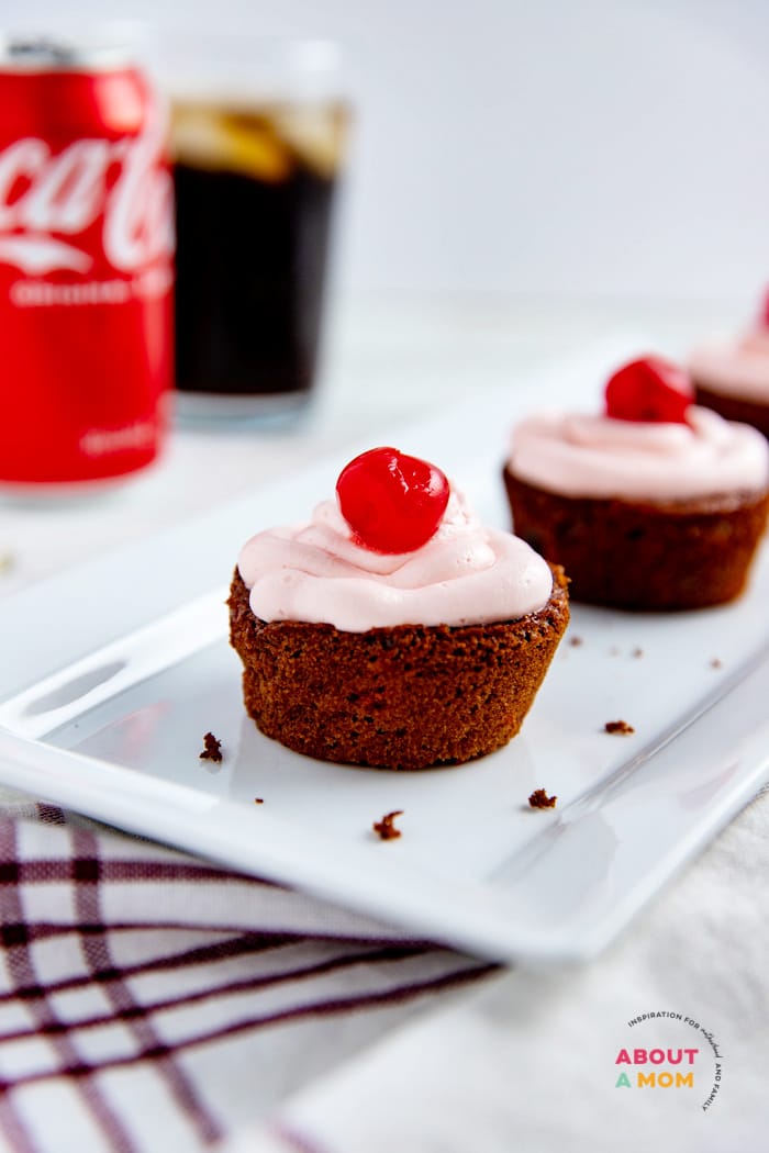 These Chocolate Cherry Coca Cola Cupcakes have a surprise inside that make them incredibly moist. The cupcakes get their amazing flavor from Coca-Cola, cherry pie filling and maraschino cherry liquid.