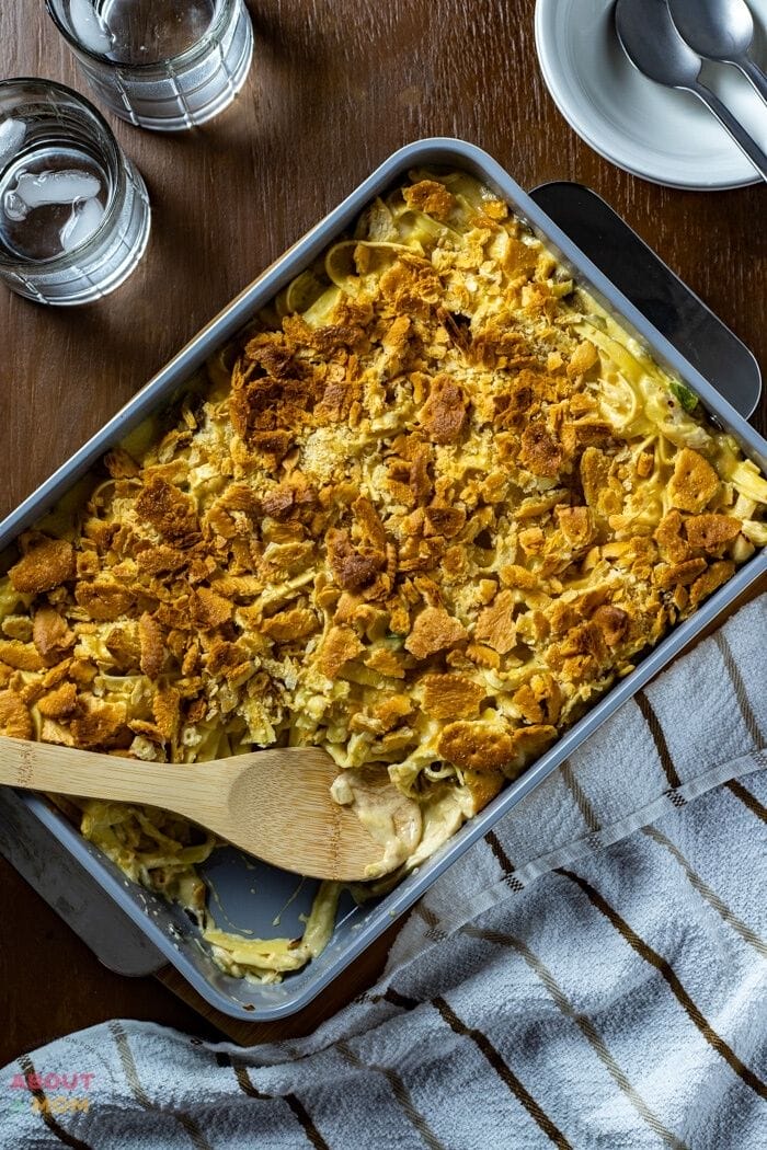 There's nothing quite like the comfort of a delicious chicken noodle casserole.  This classic casserole is filled with chicken, noodles, vegetables, and creamy made-from-scratch sauce. Topped with crunchy, buttery crackers this recipe is packed with flavor.