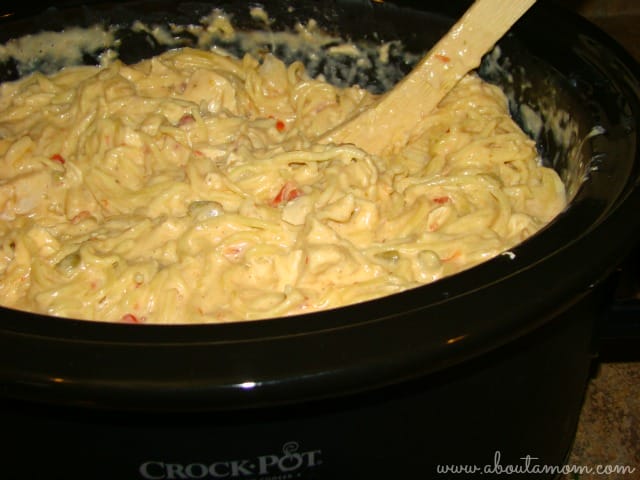 Feeding a large family can be a bit tricky. This classic crockpot cheesy chicken spaghetti made with Velveeta and Rotel tomatoes is budget-friendly, will feed a crowd and is a delicious meal the whole family will enjoy.