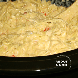 Feeding a large family can be a bit tricky. This classic crockpot Cheesy Chicken Spaghetti with Velveeta and Rotel Tomatoes is budget-friendly, will feed a crowd and is a delicious meal the whole family will enjoy.
