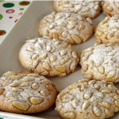 Pignoli cookies also known as pine nut cookies is a macaroon typical of Sicily, Italy. It is a very popular Italian cookie and holiday cookie recipe. Pignoli cookies are made with almond paste and pine nuts, but no flour.
