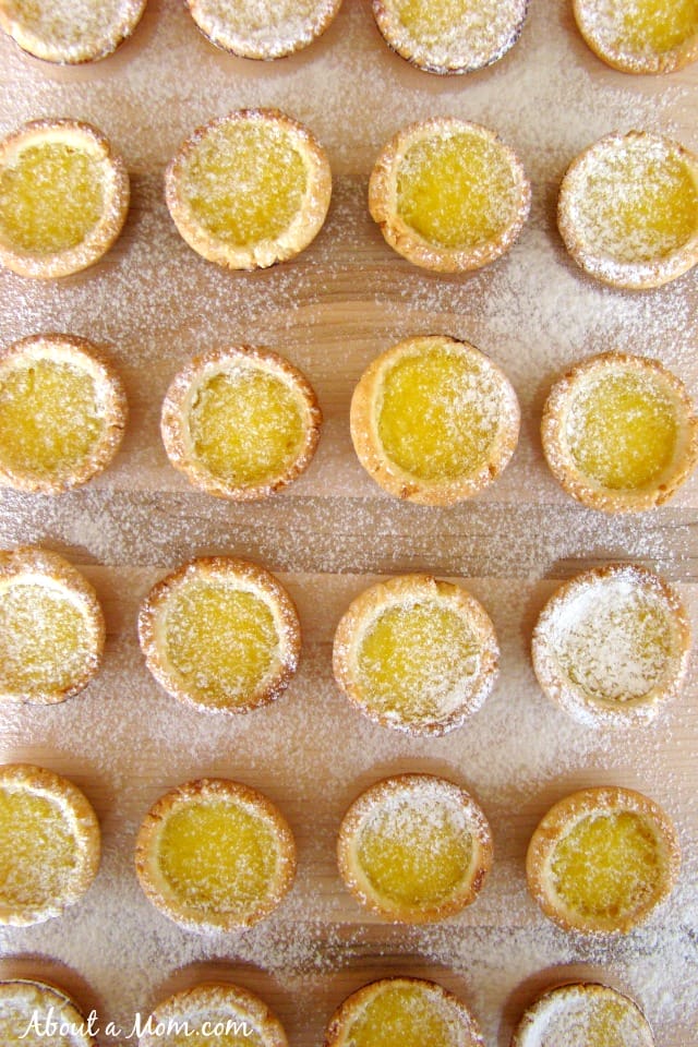 These bite size lemon tartlets little gems. The tart shells are essentially a simple shortbread crust. The buttery tarts are then filled with a luscious lemon curd. The perfect balance of sweet and sour. 