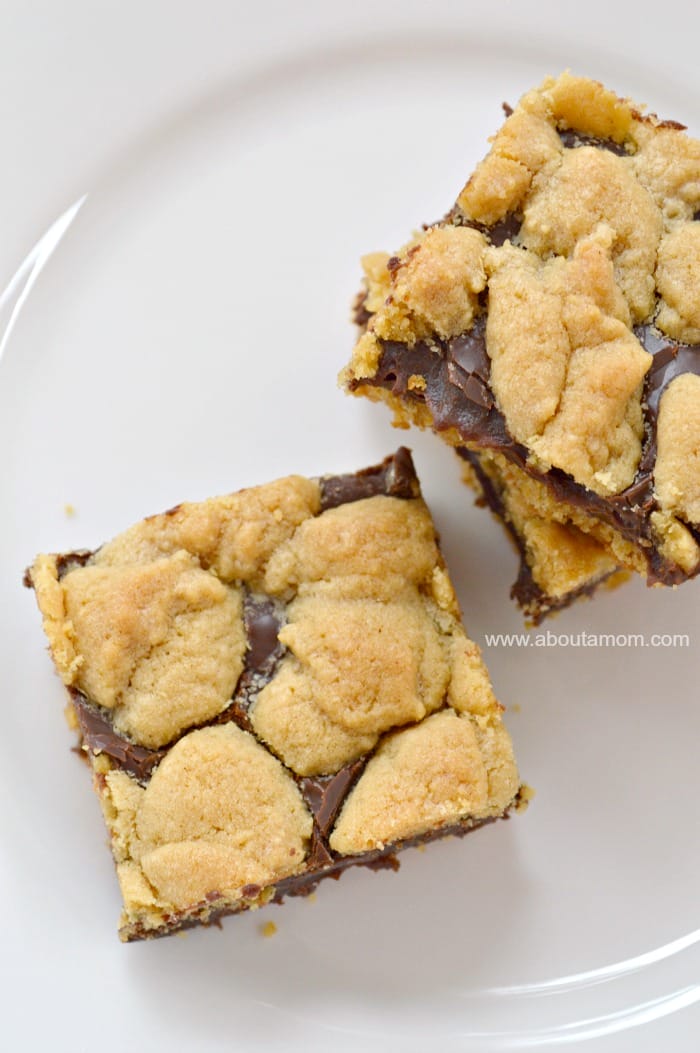 With just a few ingredients you can have a delicious cake or ooey gooey cookies, like these Chocolate-Peanut Butter Cake Mix Cookie Bars. This cake mix cookie bar recipe is pure decadence and incredibly simple to make!