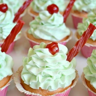 Cherry Limeade Cupcakes are the perfect summertime dessert. A sweet cherry cupcake topped with a tangy buttercream frosting. Don't forget the cherry on top!