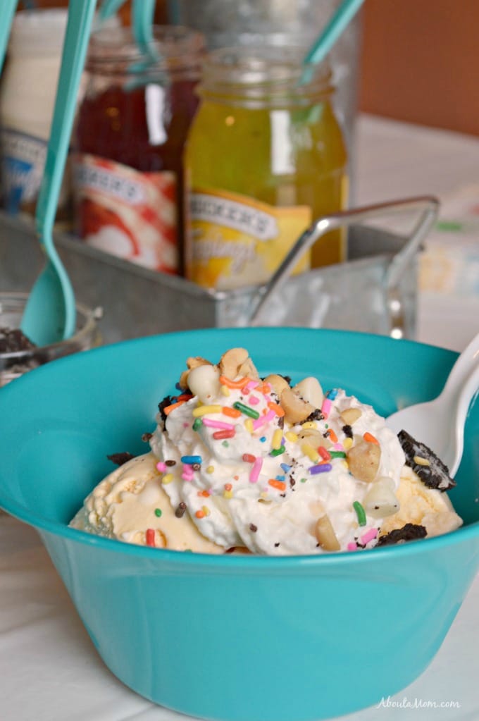 bowl of ice cream with whipped cream and sprinkles