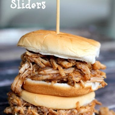 Feed a crowd or a hungry family with these slow cooker pulled pork sliders. Slow cooked for hours in a sweet and tangy sauce, this tender pulled pork is full of flavor.