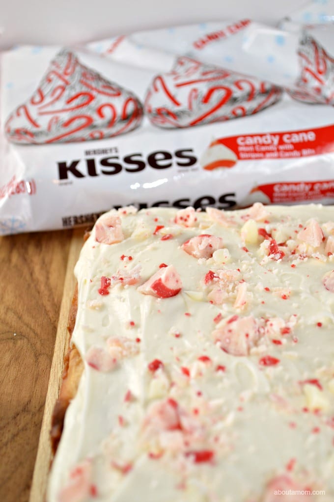 Tender peppermint infused sugar cookie bars, topped with a sweet peppermint cream cheese frosting. These Peppermint Sugar Cookie Bars are perfect for your holiday parties and gift giving.