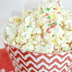 White chocolate, popcorn and festive sprinkles make the perfect holiday popcorn mix. This simple to prepare holiday popcorn is sure to be a hit at your holiday gatherings.