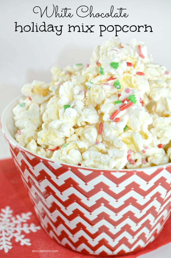 White chocolate, popcorn and festive sprinkles make the perfect holiday popcorn mix. This simple to prepare holiday popcorn is sure to be a hit at your holiday gatherings.