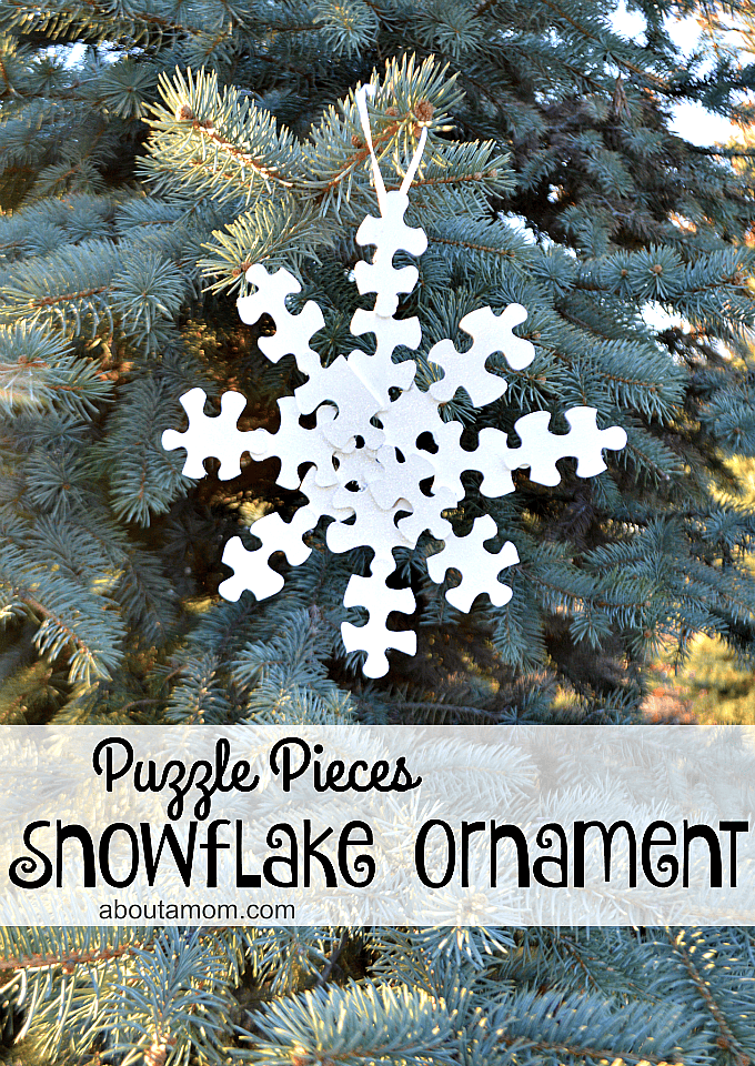 Snowflake Christmas ornament made from puzzle pieces.
