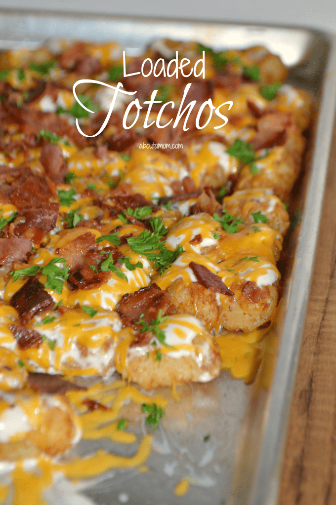 Loaded Tater Tots smothered in Ranch Dressing, Bacon and Cheddar Cheese