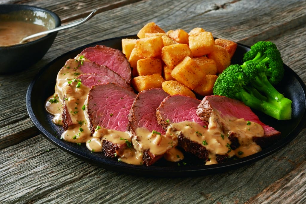 Brave the cold and head out to try the new choices at Outback Steakhouse like slow roasted sirloin with a savory sauce. Delicious new side items too. 