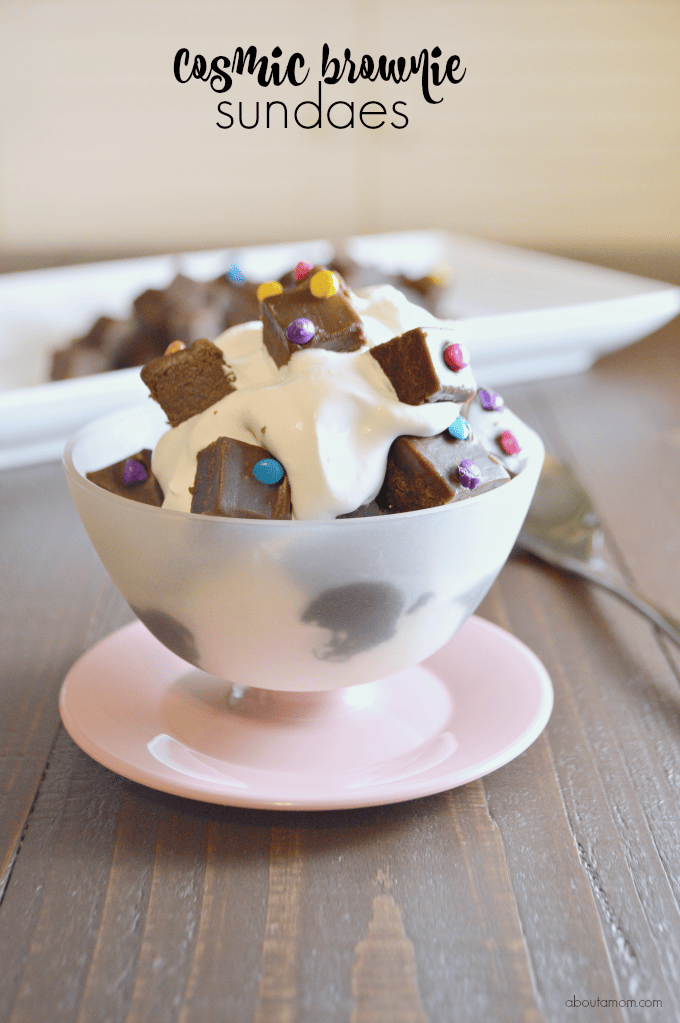 Vanilla ice cream, hot fudge sauce, whipped cream, and Little Debbie® Cosmic Brownies come together to make oh-so fun Cosmic Brownie Sundaes. It's such a wonderful treat!