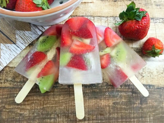 Summer is the perfect time for homemade ice pops. If you want the kids to eat less sugar, and eat more fruit, this healthy strawberry kiwi ice pops recipe is for you.