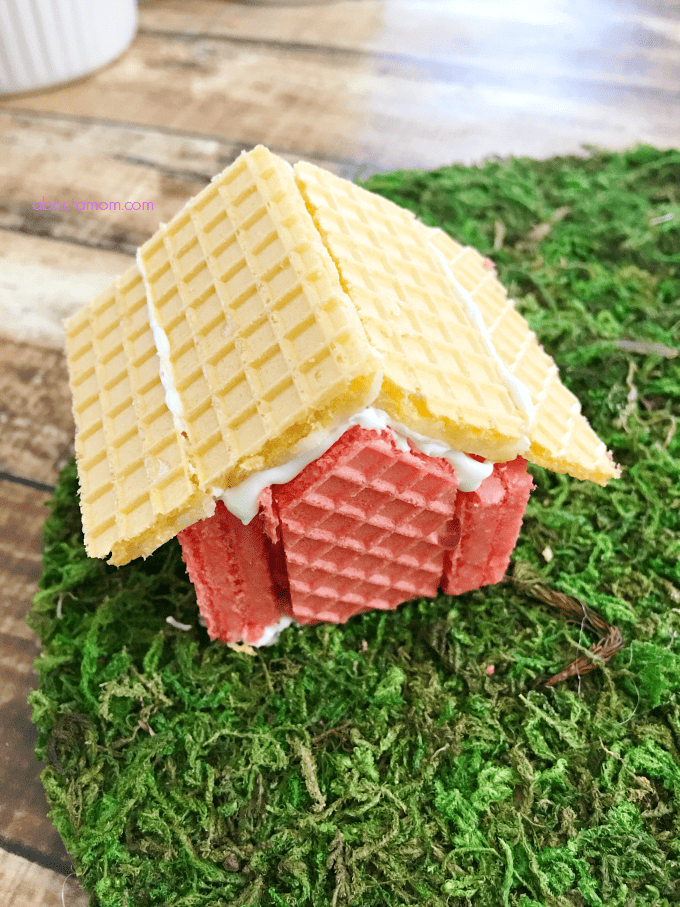 Here's a fun edible food craft to do with the kids. A sweet and whimsical wafer cookie village, inspired by Voortman Wafer cookies. Perfect for your fairy friends.