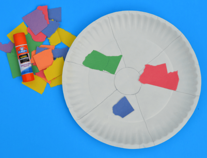 This beach ball craft is a fun summer themed paper plate kid craft. 