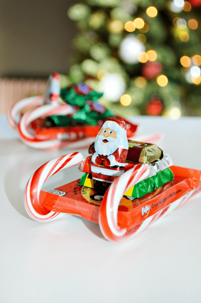 Let's talk about the candy sleighs that I made! It's easy to turn a few pieces of candy into something really fun. These are so simple to put together, and they are oh-so jolly and festive. I love giving and receiving homemade Christmas gifts. These easy-to-make candy sleighs are great for gift giving. Make this DIY Christmas gift for teachers, co-workers, classmates, neighbors or anyone who you'd like to treat. 