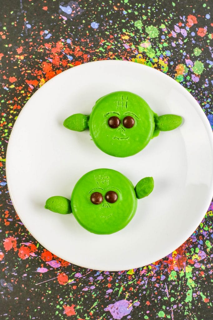 May the 4th be with you! Did you know that today, May 4, is Star Wars Day? I have some adorable Baby Yoda Cookies that are perfect for the celebration. Requiring few ingredients, these dipped OREO no-bake Baby Yoda cookies are super easy to make and taste amazing.