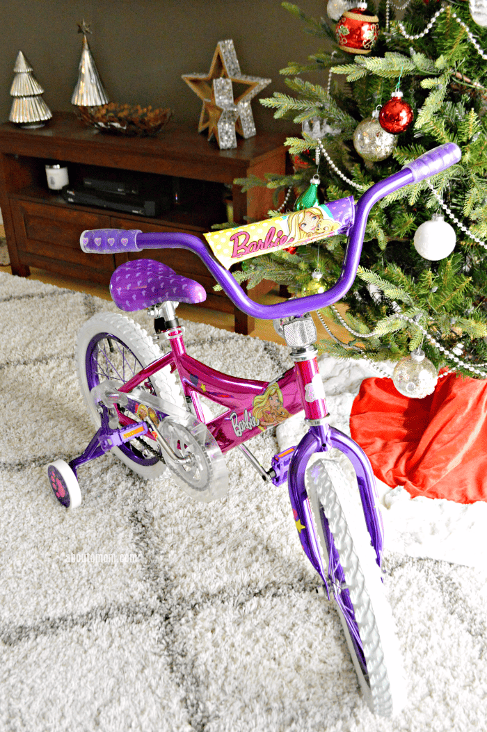 Let her ride in style. The 16" Barbie Girls Bike by Dynacraft, available at Walmart, is perfect for the little girls on your holiday shopping list.