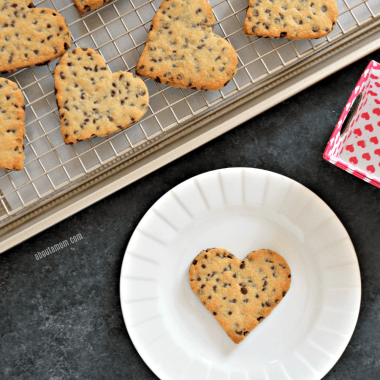 Nothing says I love you like a warm from the oven chocolate chip cookie. Except, of course, when it comes in the shape of a heart. These heart shaped chocolate chip cookies are the perfect way to say "I love you" this Valentine's Day or any day of the year.