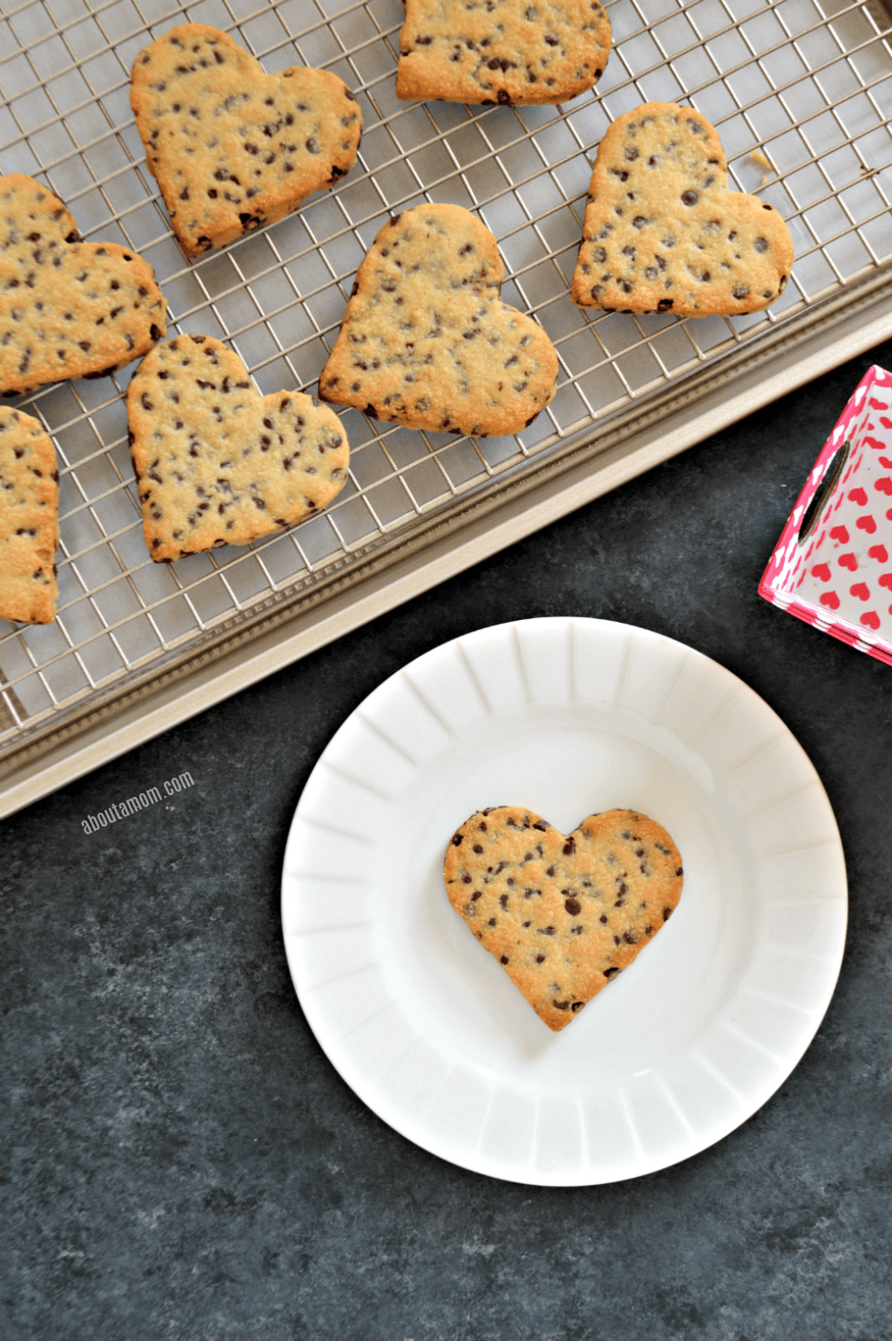 Nothing says I love you like a warm from the oven chocolate chip cookie. Except, of course, when it comes in the shape of a heart. These heart shaped chocolate chip cookies are the perfect way to say "I love you" this Valentine's Day or any day of the year.