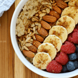 The star of this fruit and nut oatmeal bowl is oats which contains important vitamins, minerals, fiber. Power it up with a variety of toppings, including: banana, blueberries, raspberries, almonds, sunflower seeds, cinnamon, flaxseed, and honey. Eating a healthy breakfast is such a fantastic way to live a better, and healthier life.