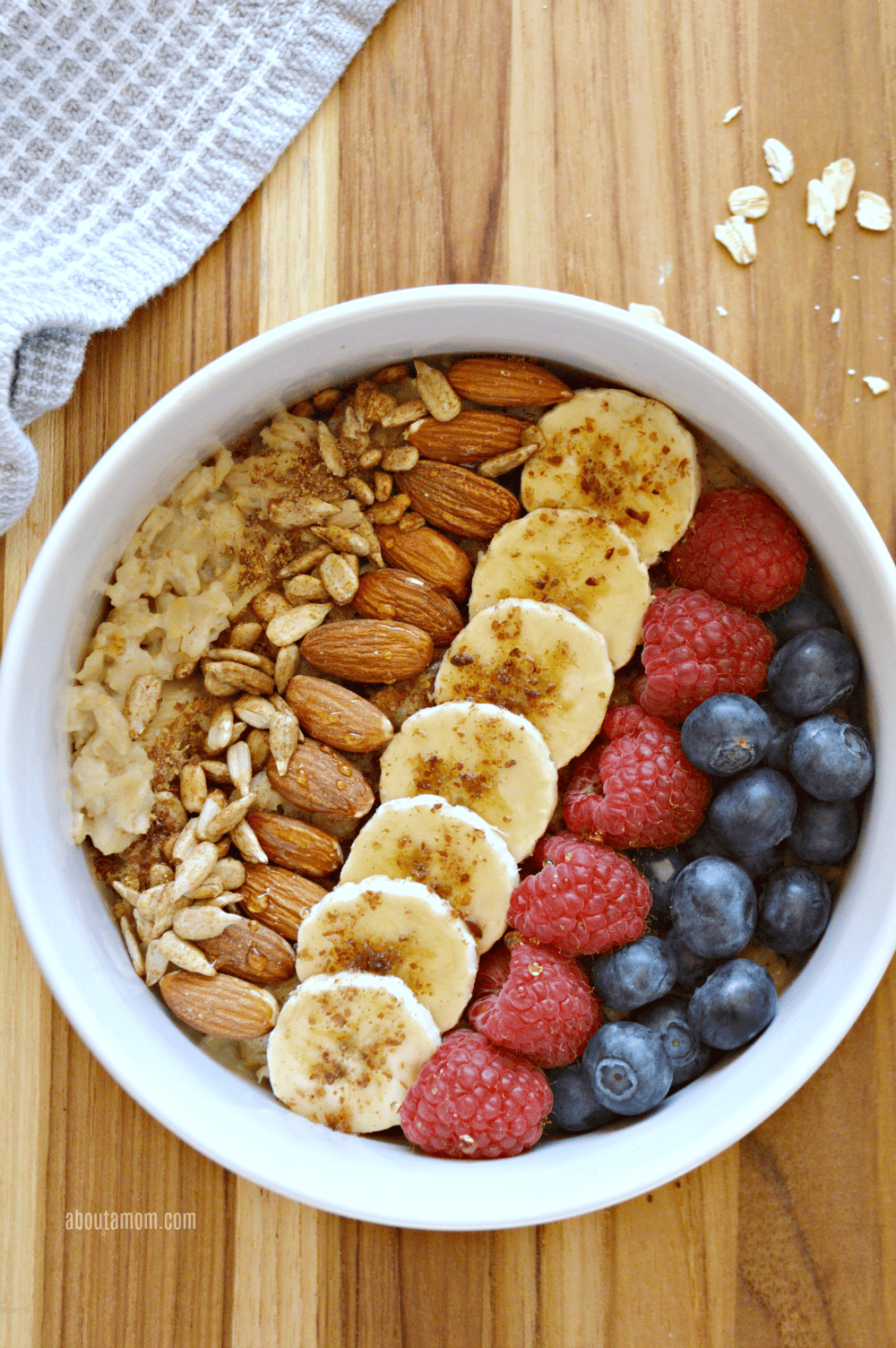 The star of this fruit and nut oatmeal bowl is oats which contains important vitamins, minerals, fiber. Power it up with a variety of toppings, including: banana, blueberries, raspberries, almonds, sunflower seeds, cinnamon, flaxseed, and honey. Eating a healthy breakfast is such a fantastic way to live a better, and healthier life.