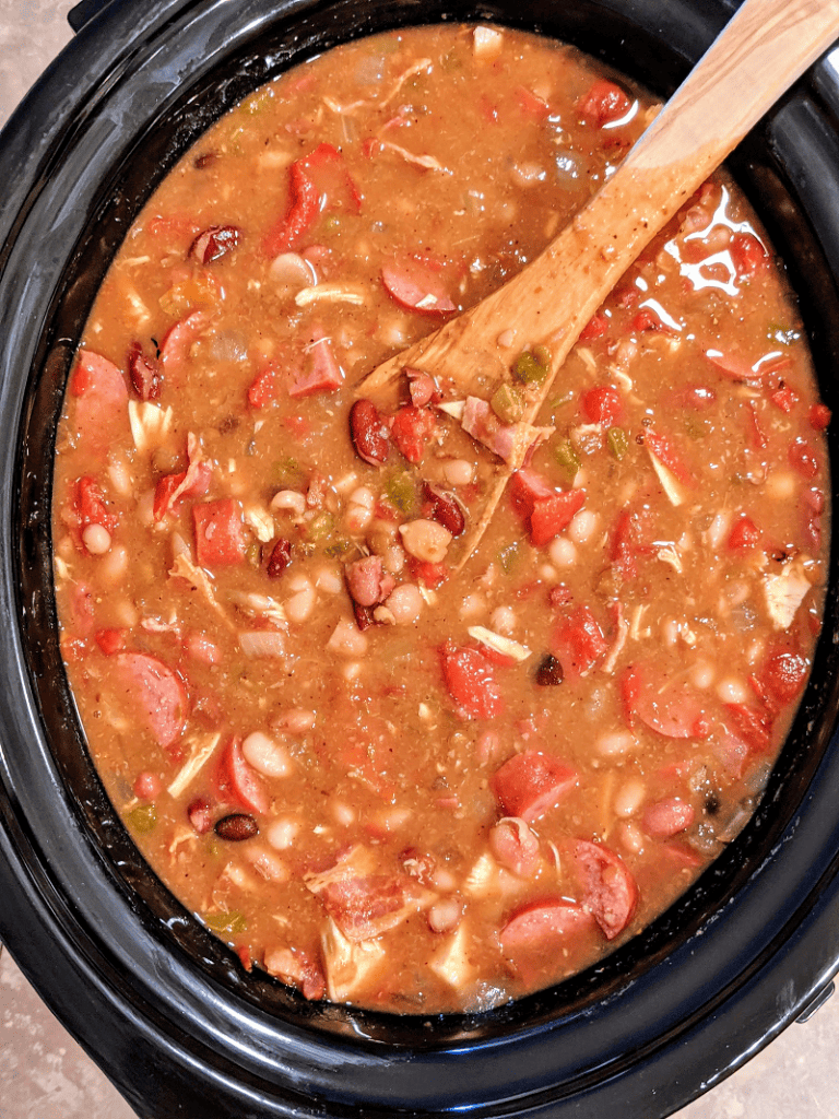 Slow Cooker Cajun 15 Bean Soup with Sausage, Chicken and Bacon - A flavorful and hearty Cajun 15 bean soup that will everyone will love, made easy in the slow cooker! This slow cooker 15 bean soup is perfect for game day, winter nights or anytime you crave comfort food.