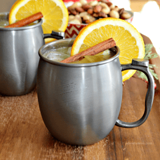 This Spiced Orange Moscow Mule cocktail is the perfect, festive drink for your holiday gatherings. The delicious holiday cocktail comes together easily and is made with orange juice, vodka, ginger beer and a simple syrup spiced with whole cloves and cinnamon sticks.