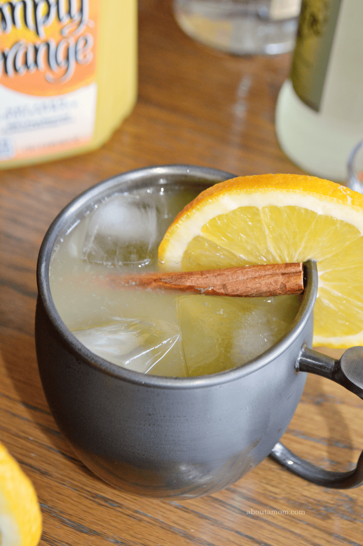 This Spiced Orange Moscow Mule cocktail is the perfect, festive cocktail for your holiday gatherings. The delicious holiday drink comes together easily and is made with orange juice, vodka, ginger beer and a simple syrup spiced with whole cloves and cinnamon sticks.