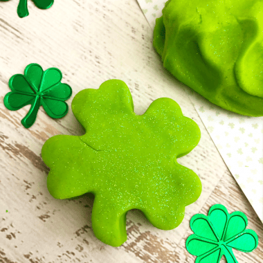 St. Patrick's Day Playdough. This glittery green homemade playdough recipe is a fun St. Patrick's Day activity for kids.