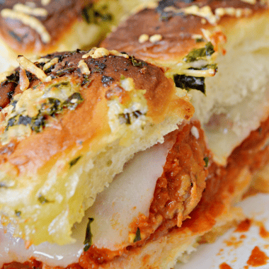 Delicious meatball parmigiana sliders are a quick and easy appetizer that everyone will love.