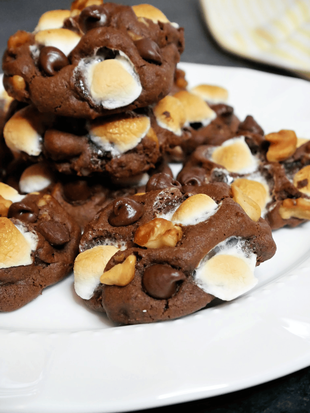 I'm a huge Gilmore Girls fan. In a Season One episode, Sookie made rocky road cookies for Rory to give to her boyfriend Dean and he loved them. I've made my own version of Sookie's Rocky Road Cookies. Much like rocky road ice cream, these cookies are chocolaty, nutty, marshmallow-ey, and oh-so decadent. They're also super simple to make. Basically, these Gilmore Girls-inspired Rocky Road Cookies are sweet and gooey and crunchy - everything you want in a cookie recipe. I know you're going to love them!