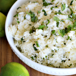 This easy-to-make and delicious Cilantro Lime Rice recipe is incredibly flavorful, and pairs perfectly with your favorite Mexican foods or as a filler for burritos.