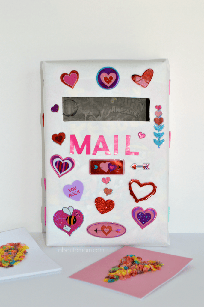 Make Valentine's Day more fun for kids with these colorful Fruity Pebbles Valentines and a cereal box mailbox to collect all your Valentine's Day cards.