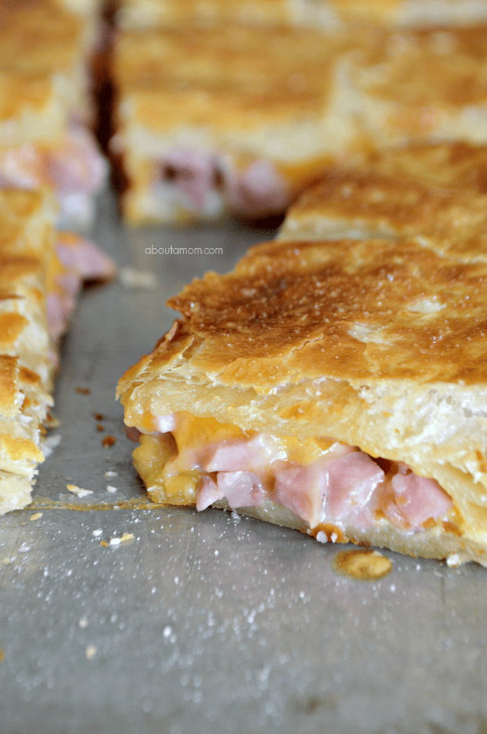 Delicious ham and cheese melted between layers of flaky puff pastry. This Ham and Cheese Puff Pastry Melt is the perfect way to use up leftover ham.