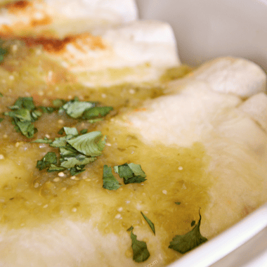 Slow Cooker Salsa Verde Beef Enchiladas. These flavorful slow cooker beef enchiladas are topped with a creamy white sauce and salsa verde. Easy to prepare, these salsa verde beef enchiladas are sure to be a hit come mealtime.