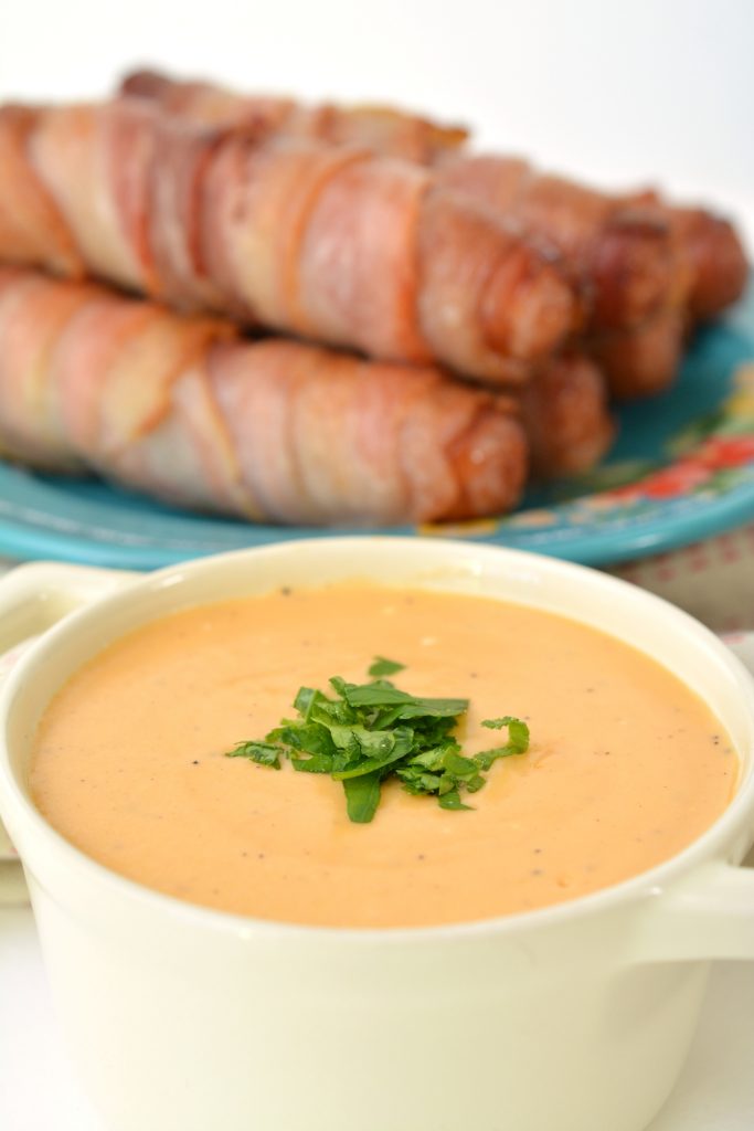 Looking for a keto dinner recipe? You will love this Keto Bacon Wrapped Brats with beer cheese sauce. Never has anything that is considered diet food tasted so good. Whether you are on a low-carb diet, keto diet or just looking for a delicious hearty meal - these bacon wrapped brats with beer cheese sauce are for you.