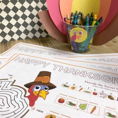 Looking for a fun Thanksgiving Day craft? Have kids make this turkey cup crayon holder and use the crayons on the printable Thanksgiving Placemat.