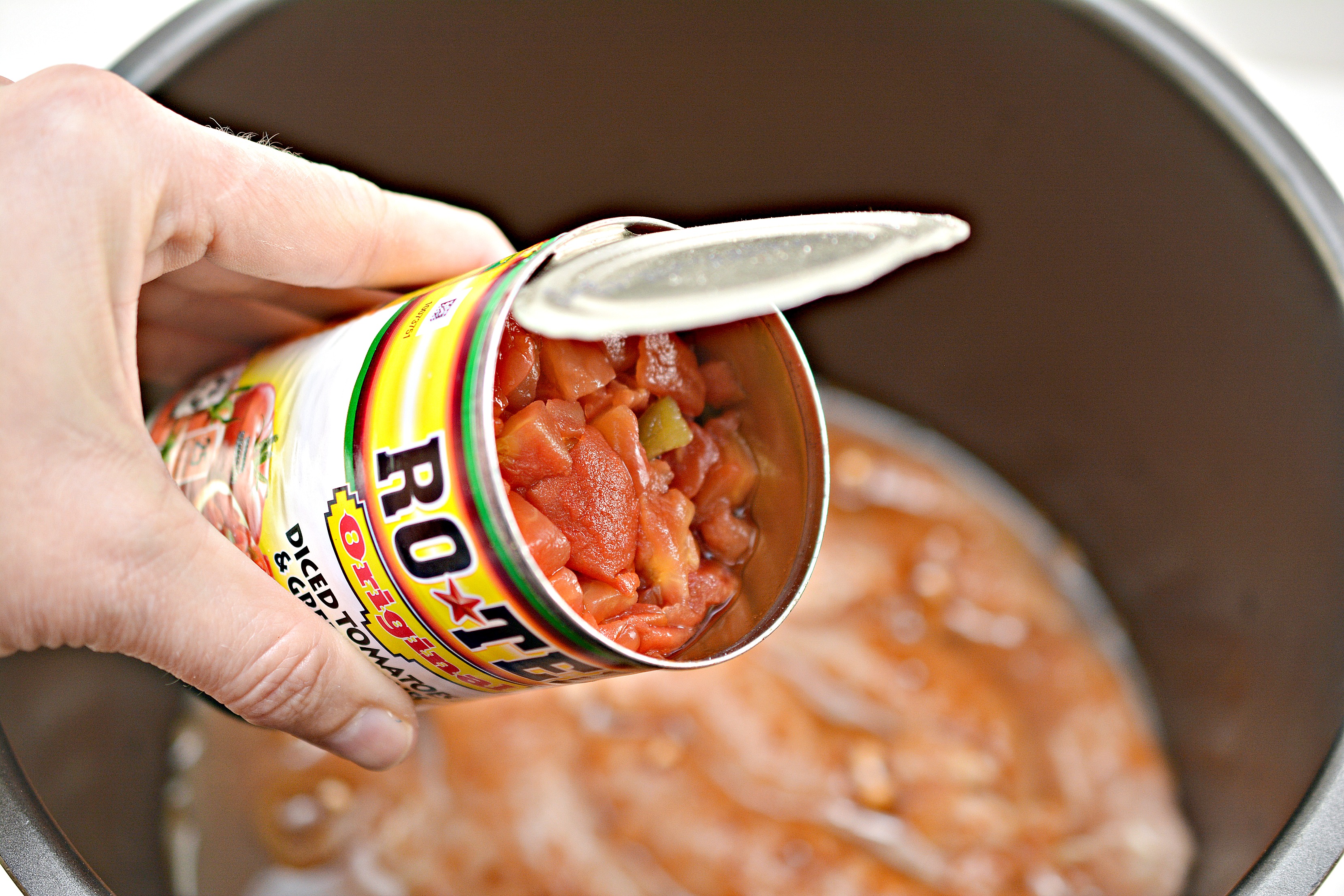 adding rotel to chicken in the Instant Pot