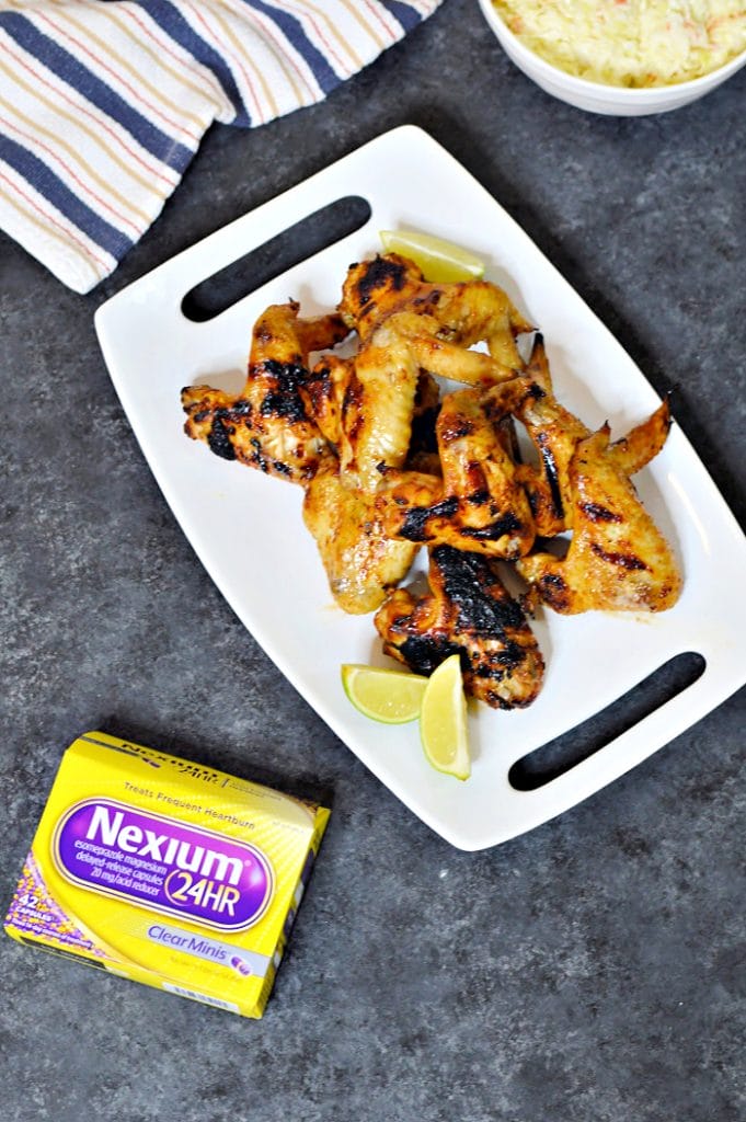Crispy grilled chicken wings with just the right amount of sweetness and a kick! This sweet and spicy grilled wings recipe is perfect for game day or anytime you want something spicy. Boiling the wings before grilling ensures they are cooked through, without getting too charred and crispy on the grill.