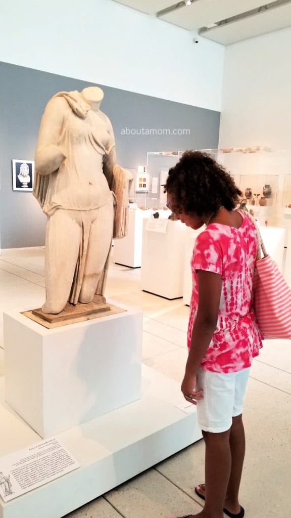 Reading-related field trips are a terrific way to keep kids excited about books. We've been reading the best-selling Percy Jackson & the Olympians series by Rick Riordan all summer long and it has been quite an adventure. Take a look at our Percy Jackson-inspired visit to the art museum to see a Greek and Roman classical antiquities collection. You won't believe what statue we saw first!