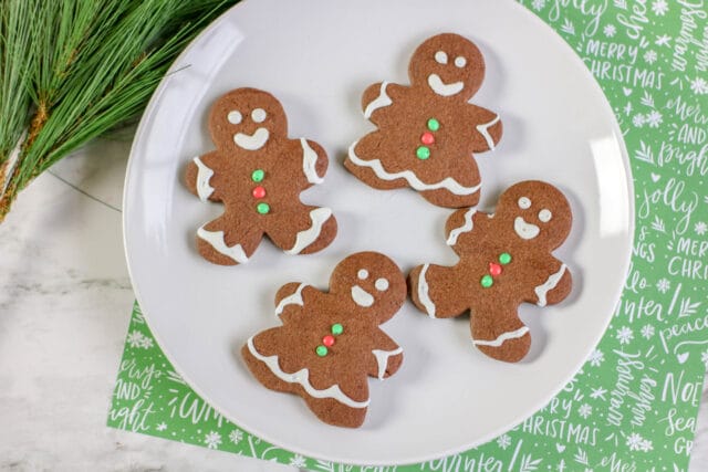 I have a fun twist on a classic Christmas cookie for you! Do you love the idea of gingerbread men, but you don't actually like the taste of gingerbread men? Don't worry, I have the perfect solution. Try this Chocolate Sugar Cookie recipe.