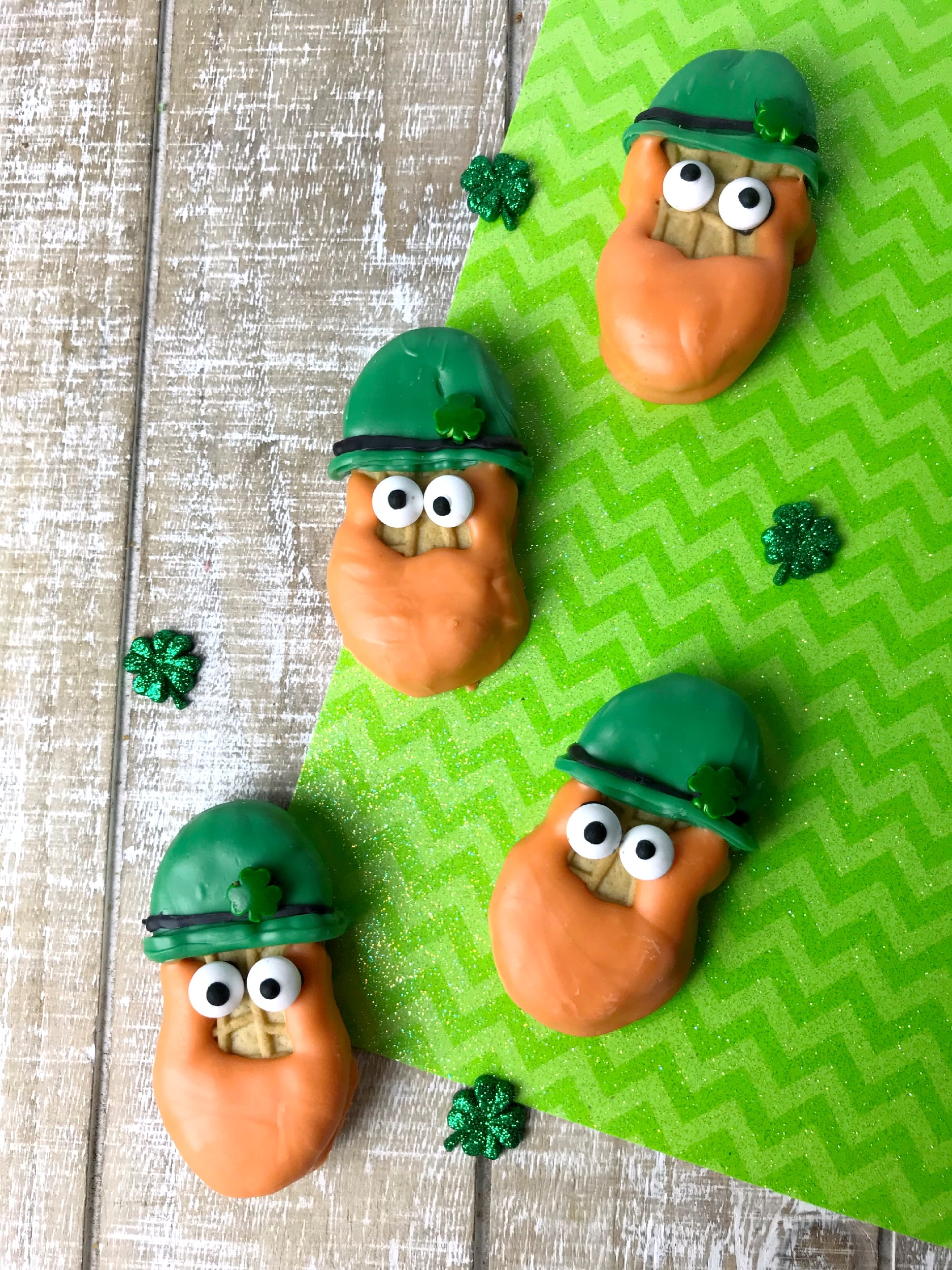If you want the cutest St Patrick's Day cookies, you want to make these adorable Leprechaun Cookies made with Nutter Butters. These cookies look so cute and they are super easy to make. Perfect for a St. Patrick's  Day party for kids and adults alike.