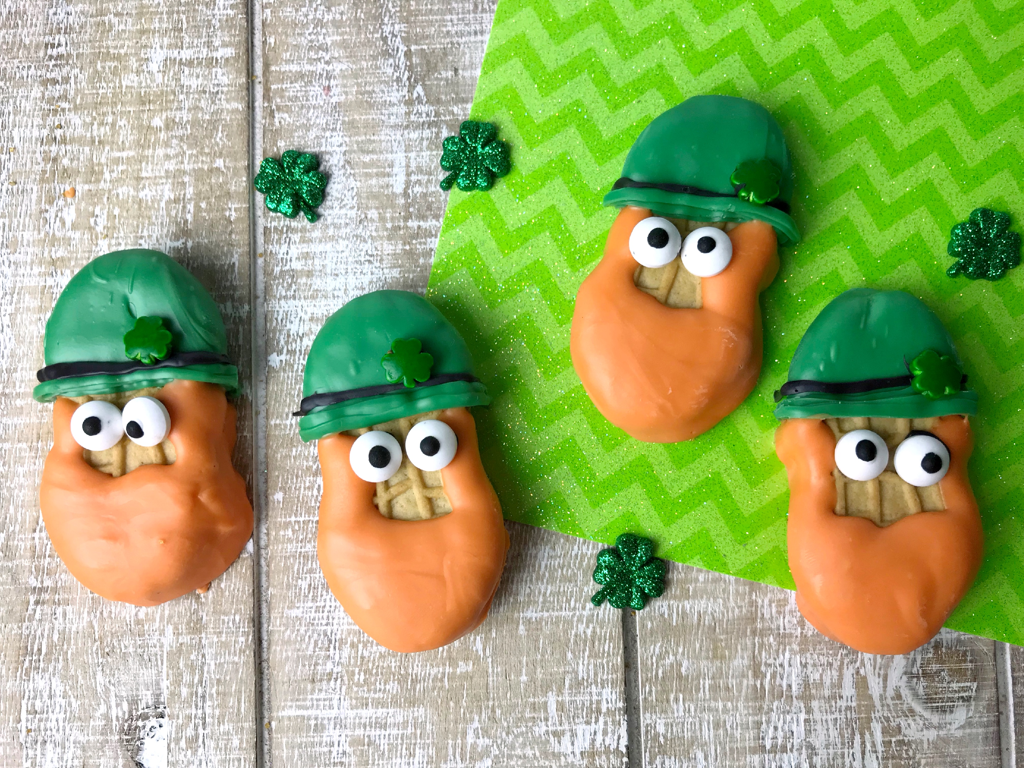 If you want the cutest St Patrick's Day cookies, you want to make these adorable Leprechaun Cookies made with Nutter Butters. These cookies look so cute and they are super easy to make. Perfect for a St. Patrick's  Day party for kids and adults alike.