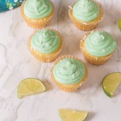 The perfect blend of lime and coconut makes these Lime Coconut Cupcakes a delicious tropical treat.  You'll love the bright tropical flavors and the homemade buttercream, topped with coconut, makes these cupcakes over-the-top delicious.