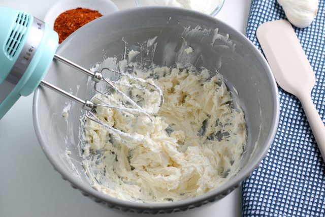 mixing cream cheese layer