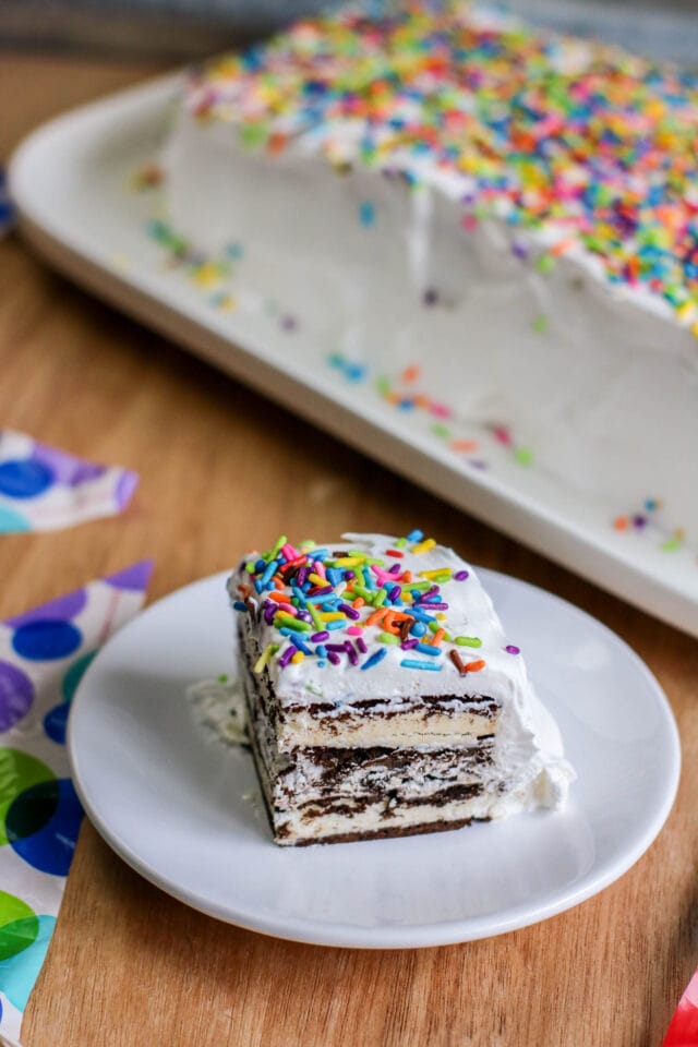 This oh-so easy Ice Cream Sandwich Cake is a delicious alternative to a store bought ice cream cake. It is perfect for birthdays and other celebrations or make this dessert for a summertime get-together.